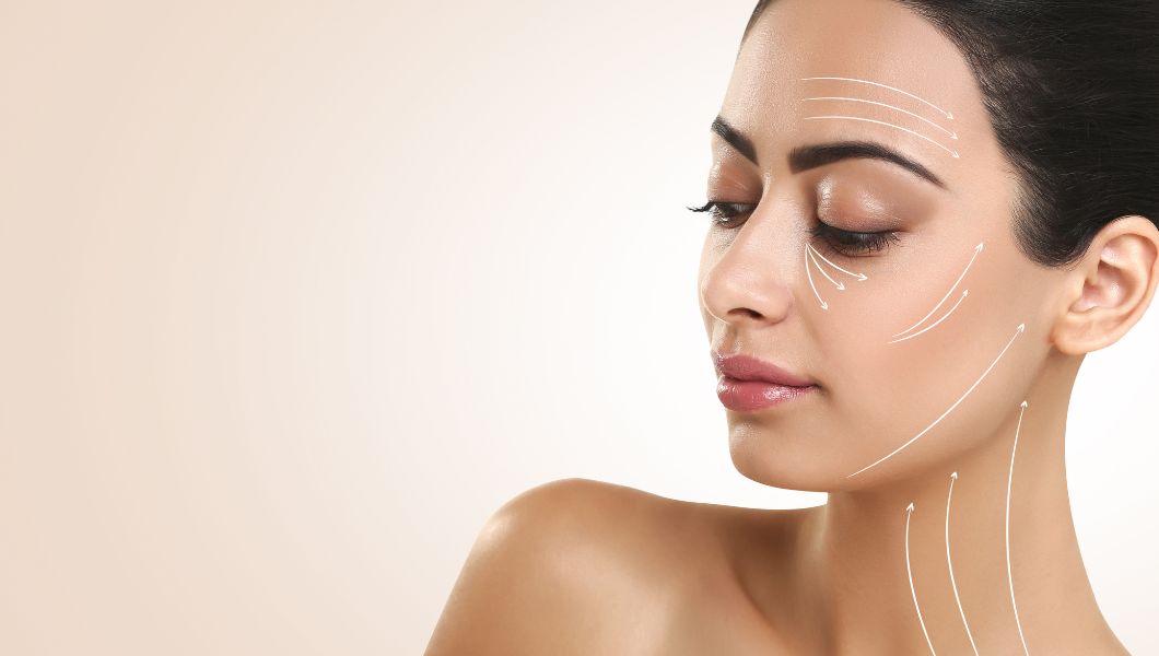 Woman with facial volume loss discussing cosmetic treatment options for “Ozempic face” correction and facial rejuvenation.